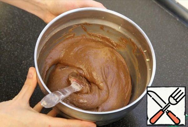 Add the melted and cooled chocolate.