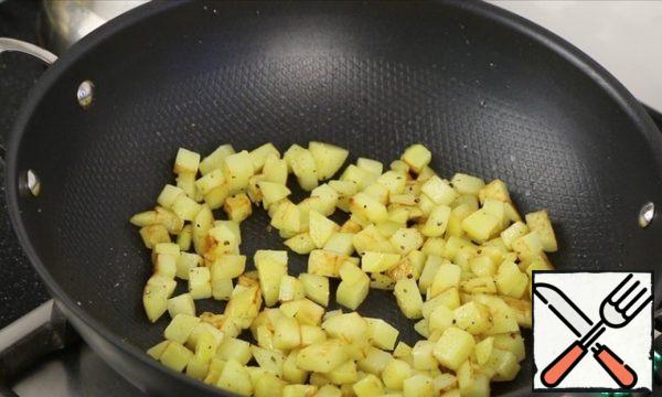On a higher-than-average heat, fry in vegetable oil until light Golden brown. Salt and pepper.