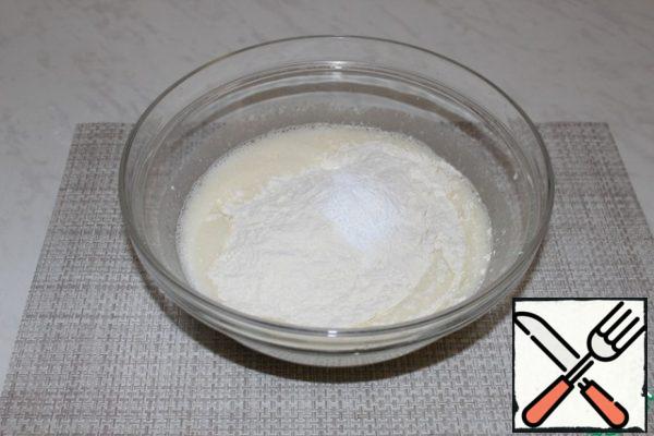 Add flour with salt and baking powder.
