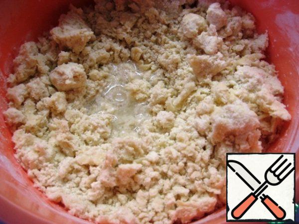 Pour cold water and, having collected the dough into a ball, knead the steep dough (if you feel that the dough is not going into a ball - you can add a little vegetable oil / flour).