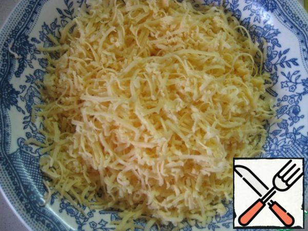 Filling: grate cheese on a coarse grater.
