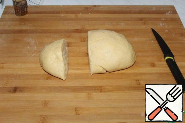 Cut 1/4 of the total amount of dough.