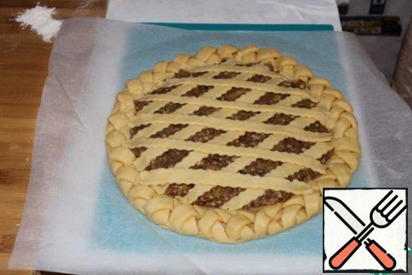 Spread on the pie in the form of a grid.