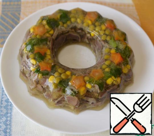 To serve, I usually heat the mold with a hair dryer. Aspic easily comes out of the mold, turn it over on a dish.
We store aspic in the cold.