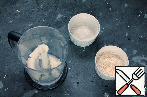Put the cream cheese (from the refrigerator), powdered sugar, coconut chips and a pinch of salt in a blender bowl. Stir until smooth. Put the finished cream in the refrigerator for 30-40 minutes. The cream can be prepared in advance and stored in a closed container in the refrigerator for up to 3 days.