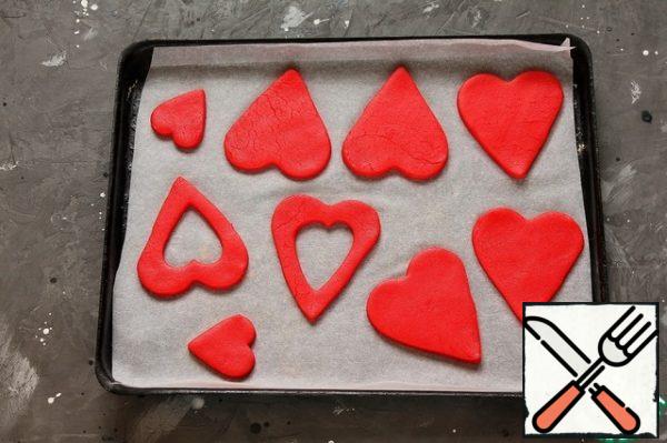 Cover the baking tray with baking paper and transfer the cookies. Bake in a preheated 180 gr oven for 8-10 minutes.