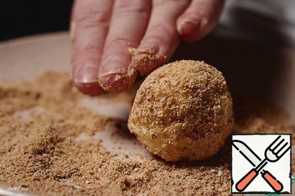 Roll the ball in breadcrumbs. I got 12 pieces. Put the balls in the freezer for 15 minutes.