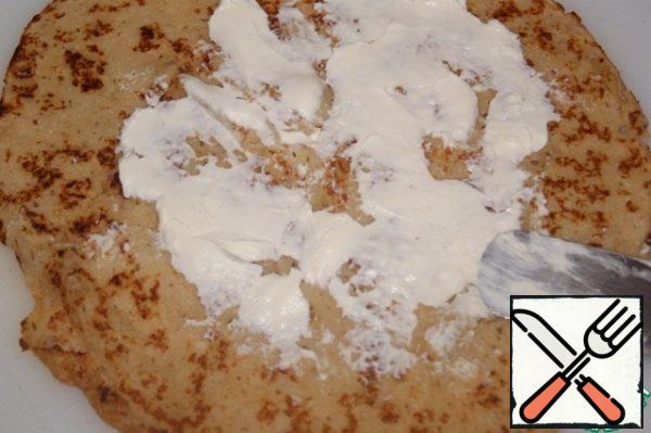 I served pancakes with caviar. Put a thin layer of cream cheese on the pancake.