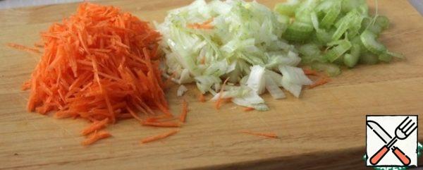 Chop the carrots, onions, and celery.