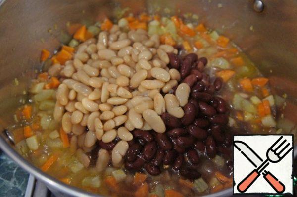 Add the beans along with the juice,