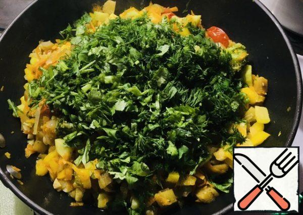 Stir, simmer until soft vegetables, do not overcook. Add clean, finely chopped greens. Mix everything.