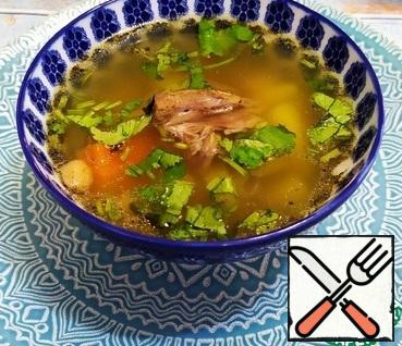 Bone broth can be either completely transparent or cloudy. This depends on the presence of protein substances and fat. The hot broth should have a glistening fat. Bon Appetit!