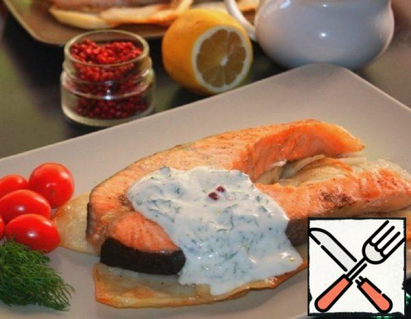 Serve the finished fish on a potato pillow with cherry tomatoes...