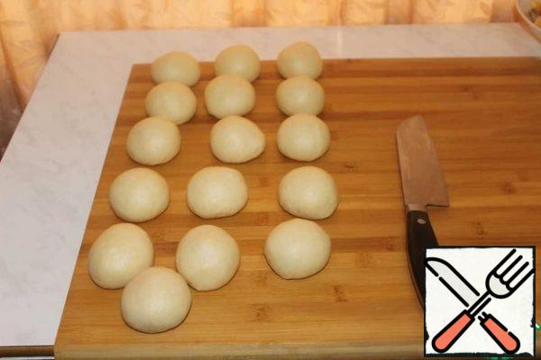 Divide the dough into equal parts. I got 16 pieces of 70-75 grams each.