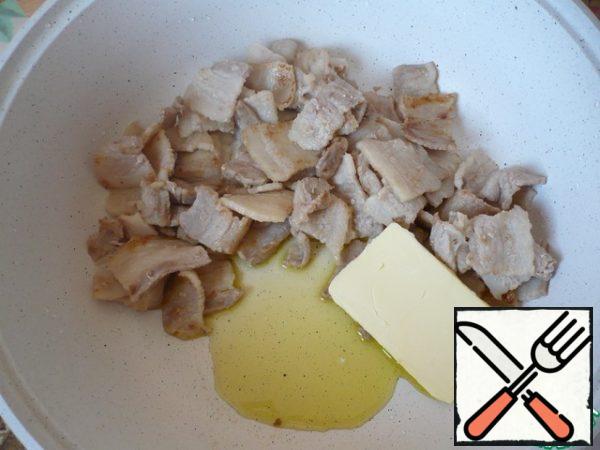Add olive oil and butter to the bacon.