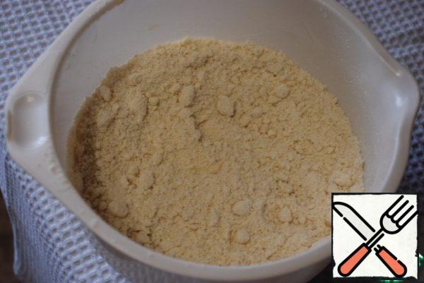Mix the flour with the sugar and butter until crumbs form.