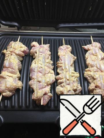 Preheat the grill. I do everything on an individual basis.
Lay out the skewers.