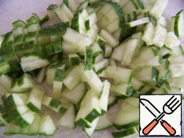 Cut cucumbers.