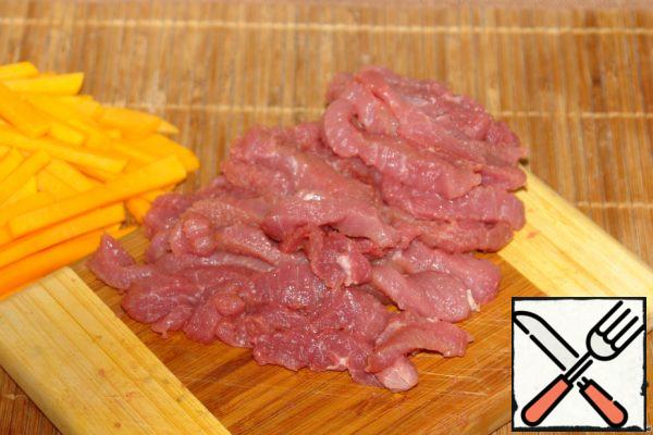 Cut the meat into strips across the fibers.