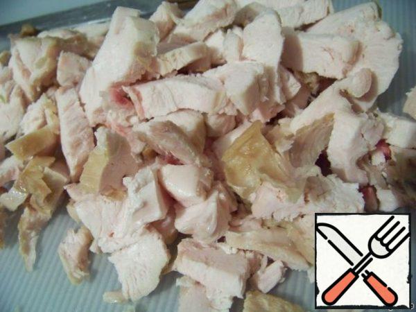 Cut the chicken breast.