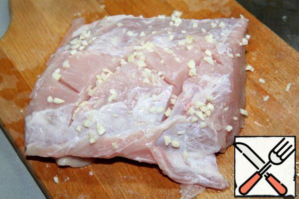 A few words about meat. I cook pork at home and, just in case, I post a way to cook it. Peel the pork from fat, make incisions and rub with garlic.