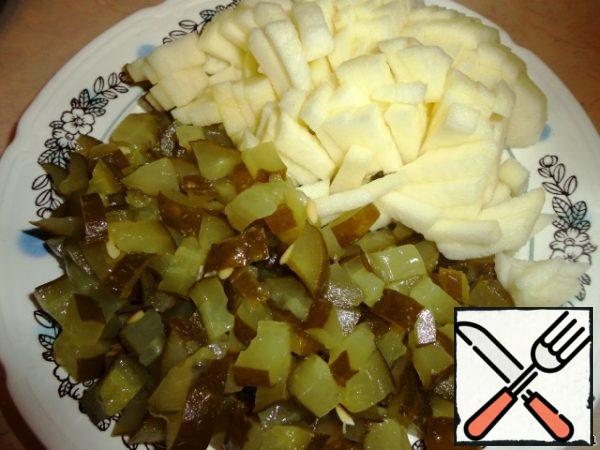 Pickles and apple (peeled) also cut into cubes.