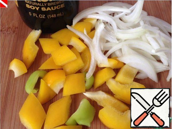 Chop the bell pepper and onion,