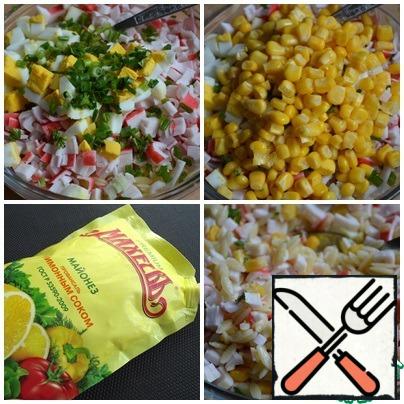 As well as finely chopped greens and corn, mix. Add salt and mayonnaise to taste, mix again. Be sure to let the salad brew for at least an hour at room temperature.