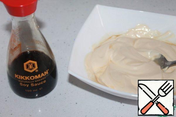 Make a salad dressing to do this, mix soy sauce, mustard and mayonnaise.