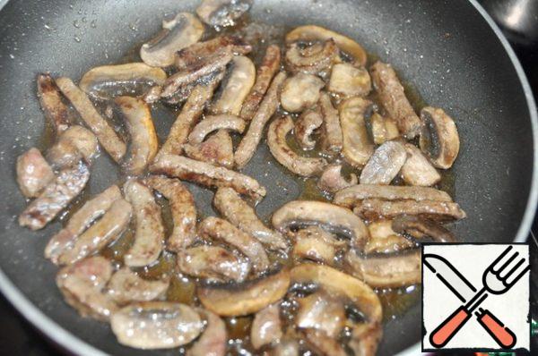 Put the mushrooms and fry all together for another 3-4 minutes.