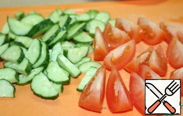 Chop the onion and tomato.