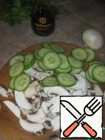 Wash cucumbers and mushrooms. cut them thinly (I use a small shredder for vegetables).