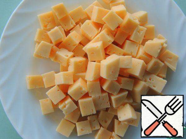 Cheese is also cut into cubes.