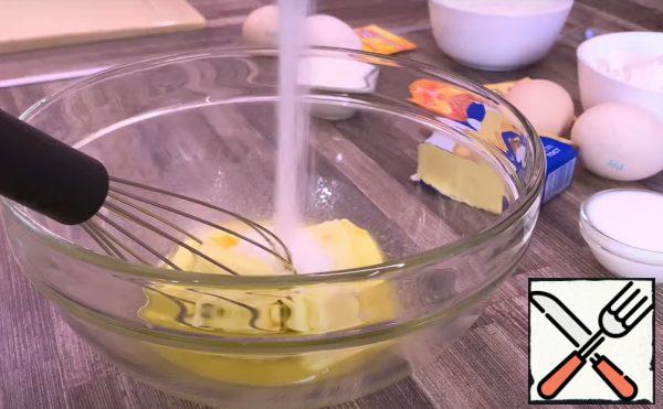 Rub the butter with sugar.