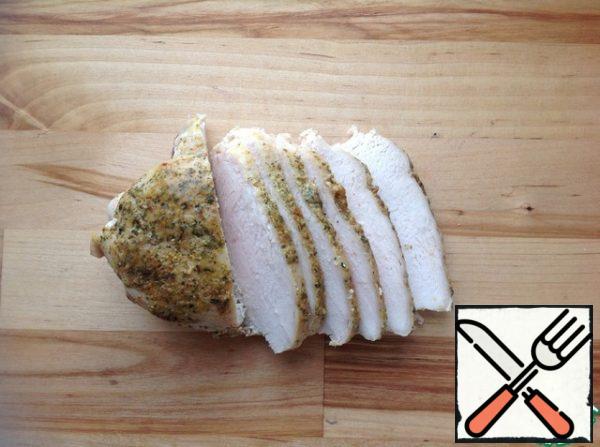 Cut the chicken breast into thin slices.