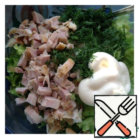 Cut the chicken into medium cubes, add mayonnaise, finely chopped dill and mix the salad.