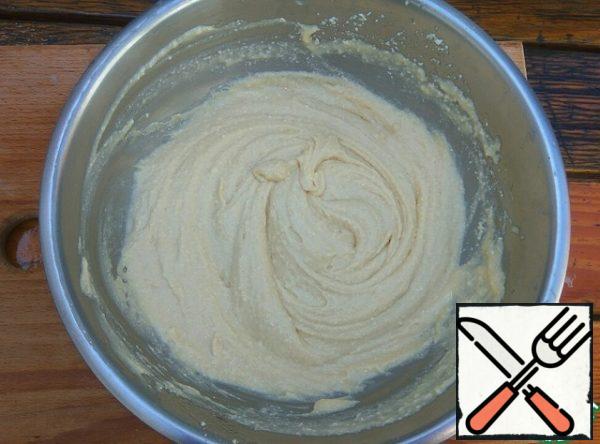 Gradually add the flour and baking powder.
The dough should be thick.