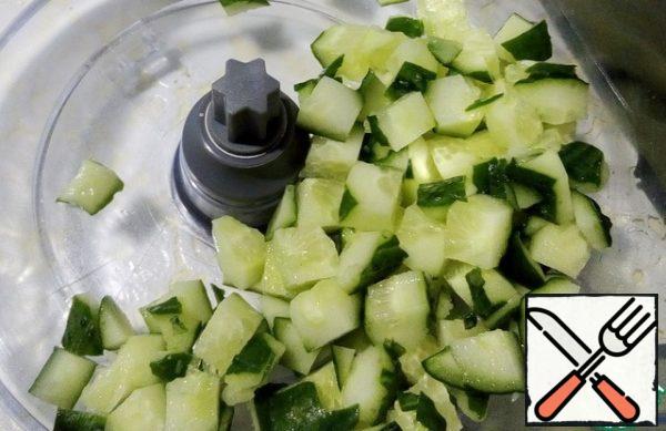 I use the same dicing attachment to cut the cucumber.