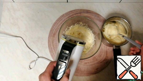 Then add 1 tablespoon of cream, beating well each time.