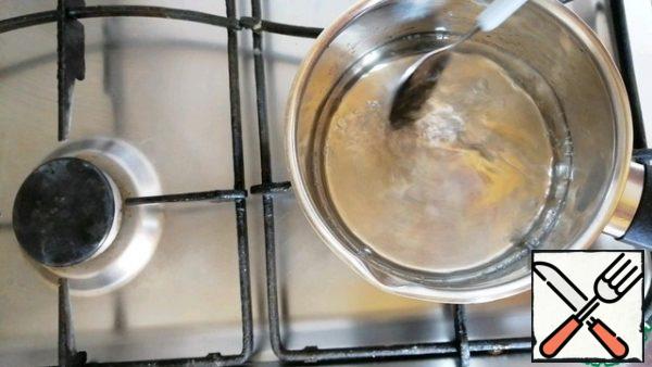 Periodically stirring bring to a boil. After boiling, cook the syrup for 2 minutes.