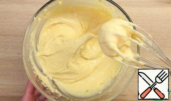 Add five eggs one at a time to the cooled dough. Add one egg and beat with a mixer until smooth. The dough should be smooth, shiny and moderately thick.