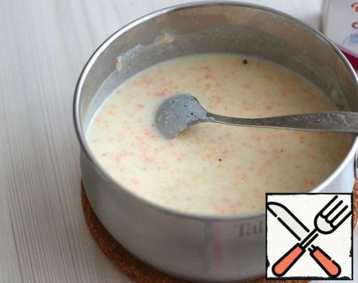 Then return the crushed vegetable mixture to the pan and add the cream (100 ml.)