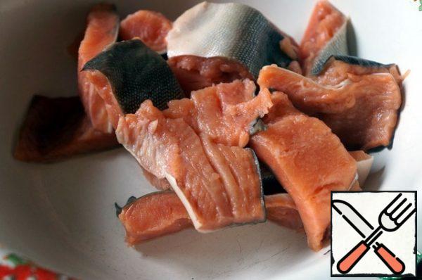 Salmon fillet cut into pieces.