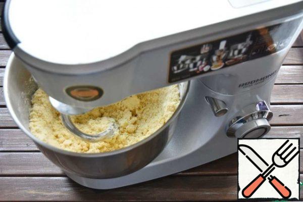 Mix flour with salt and add to the mixture of eggs and butter. Knead the dough.