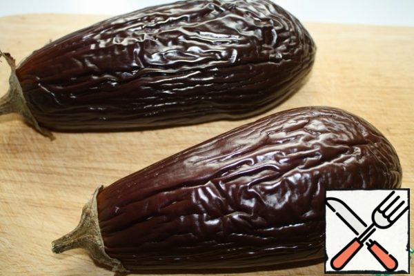 Chop the eggplant with a knife and bake at 200 degrees for about 45-50 minutes.