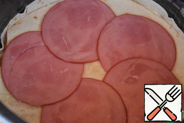 Put the ham on the third tortilla...