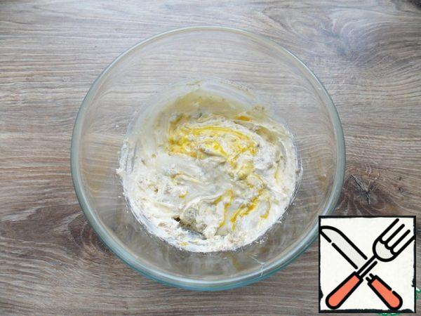 Add halva, condensed milk, yolk and powdered sugar to the butter and mix.