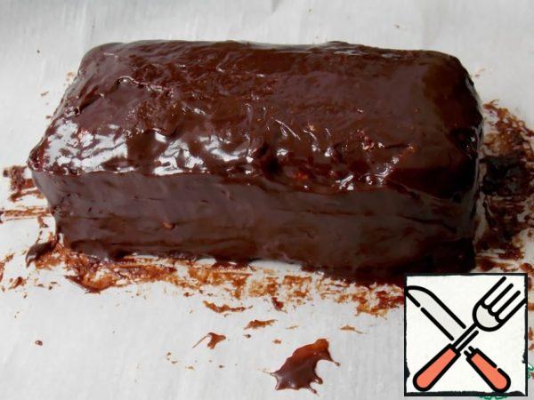 Cover the cake with icing on all sides.