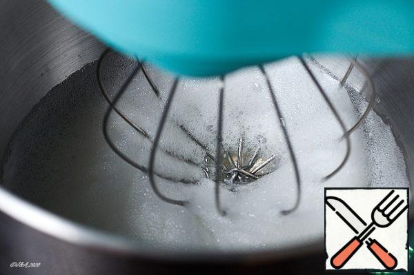 Whisk the protein with the acid into a fluffy foam until all the liquid protein disappears.