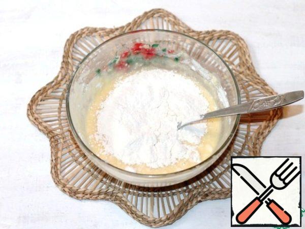In the liquid mixture, stir in small parts of the flour mixture.